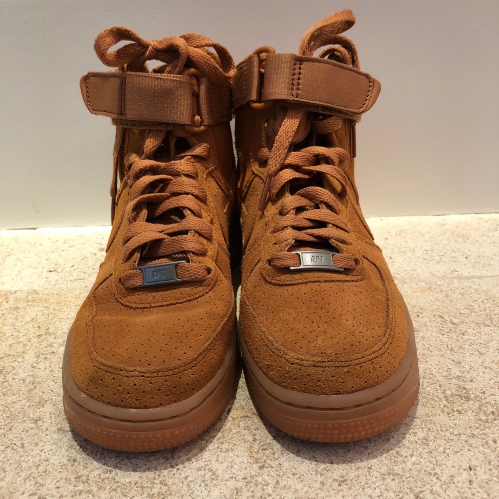 Brown suede Nike sneakers
